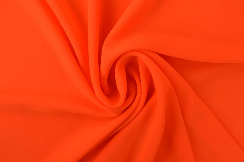 Donker oranje chiffon stof